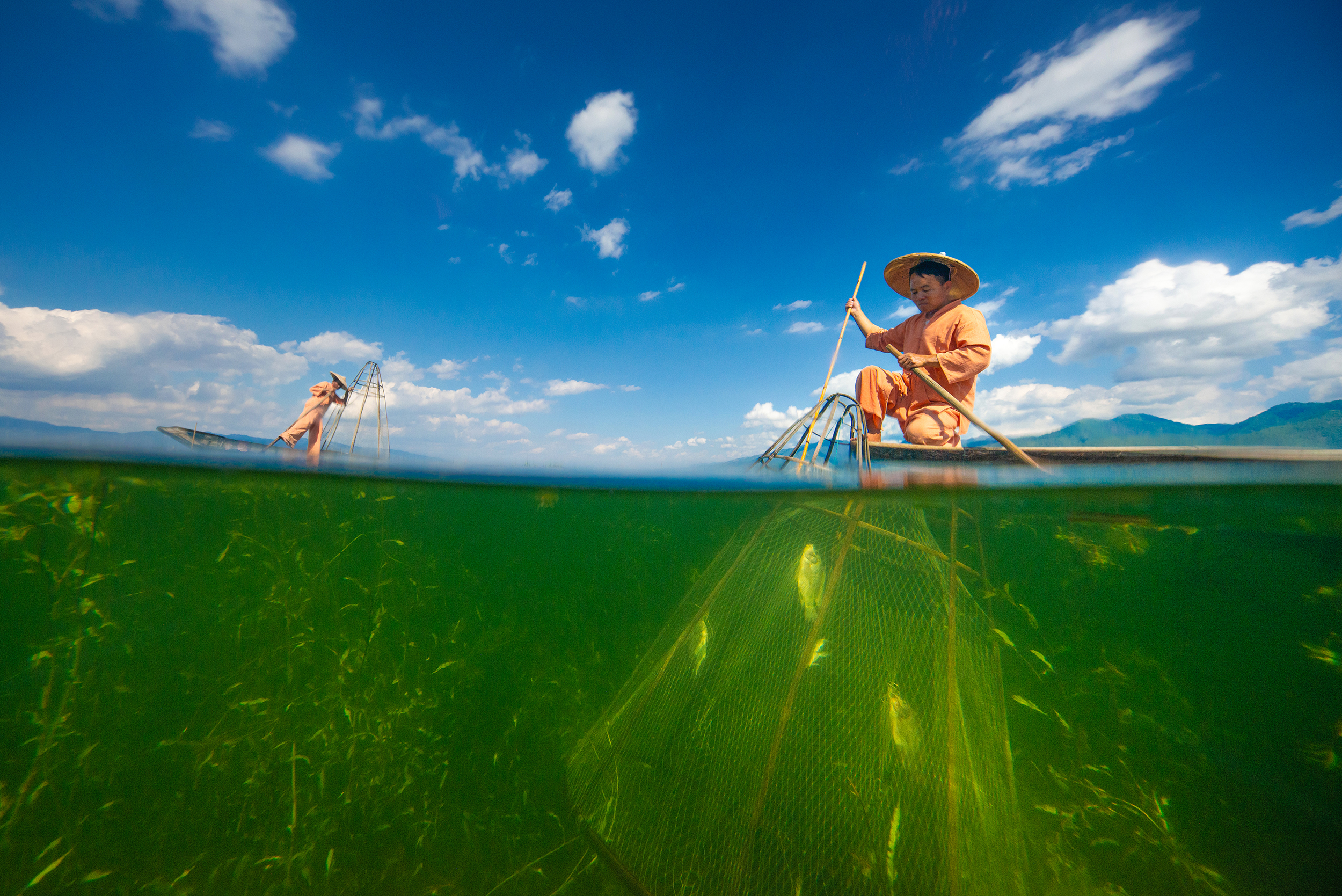 A split view of life and fishing activity on Inle Lake.